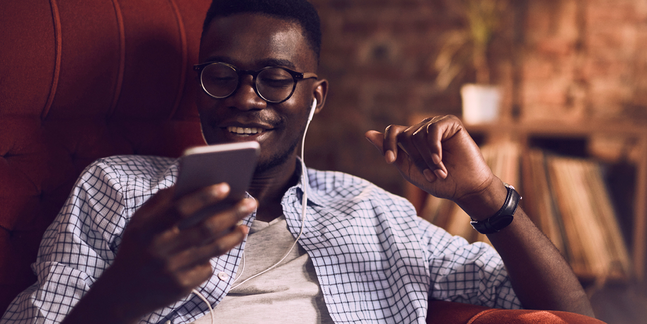 person on their mobile phone relaxed